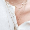 accumulation bohème coeur étoiles parchemin message médaille sainte vierge marie madone colliers bijoux or fait main bijoux créateur france