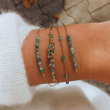 bracelets joncs fin or perles tissage pierres précieuses émeraudes et perles nacres blanches or fait main en france bijoux créateur tendance