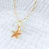collier étoile de mer tendance été summer coquillage cauri nacre fleur or fait main bijoux créateur made in france